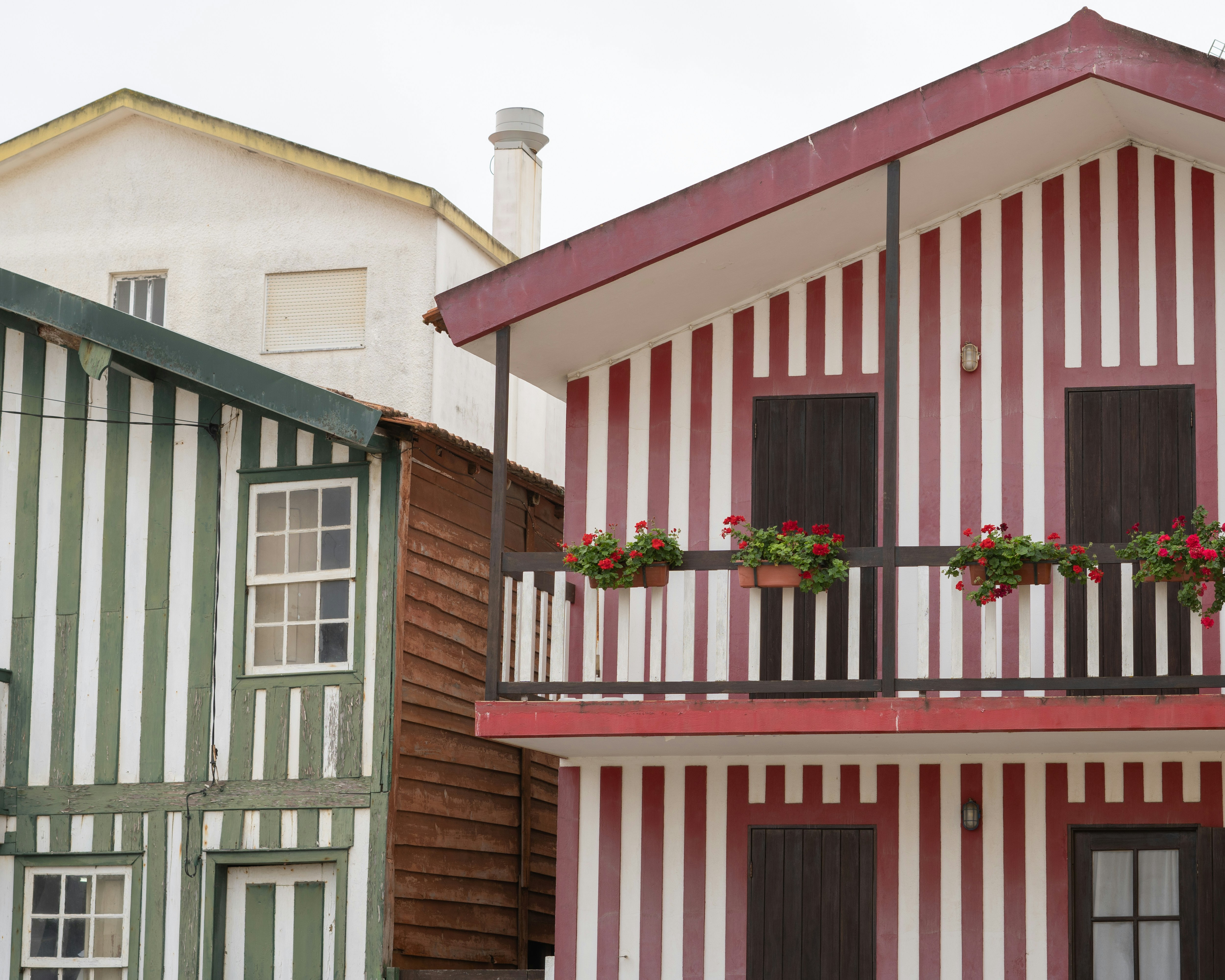 Striped buildings in different colors sit together.