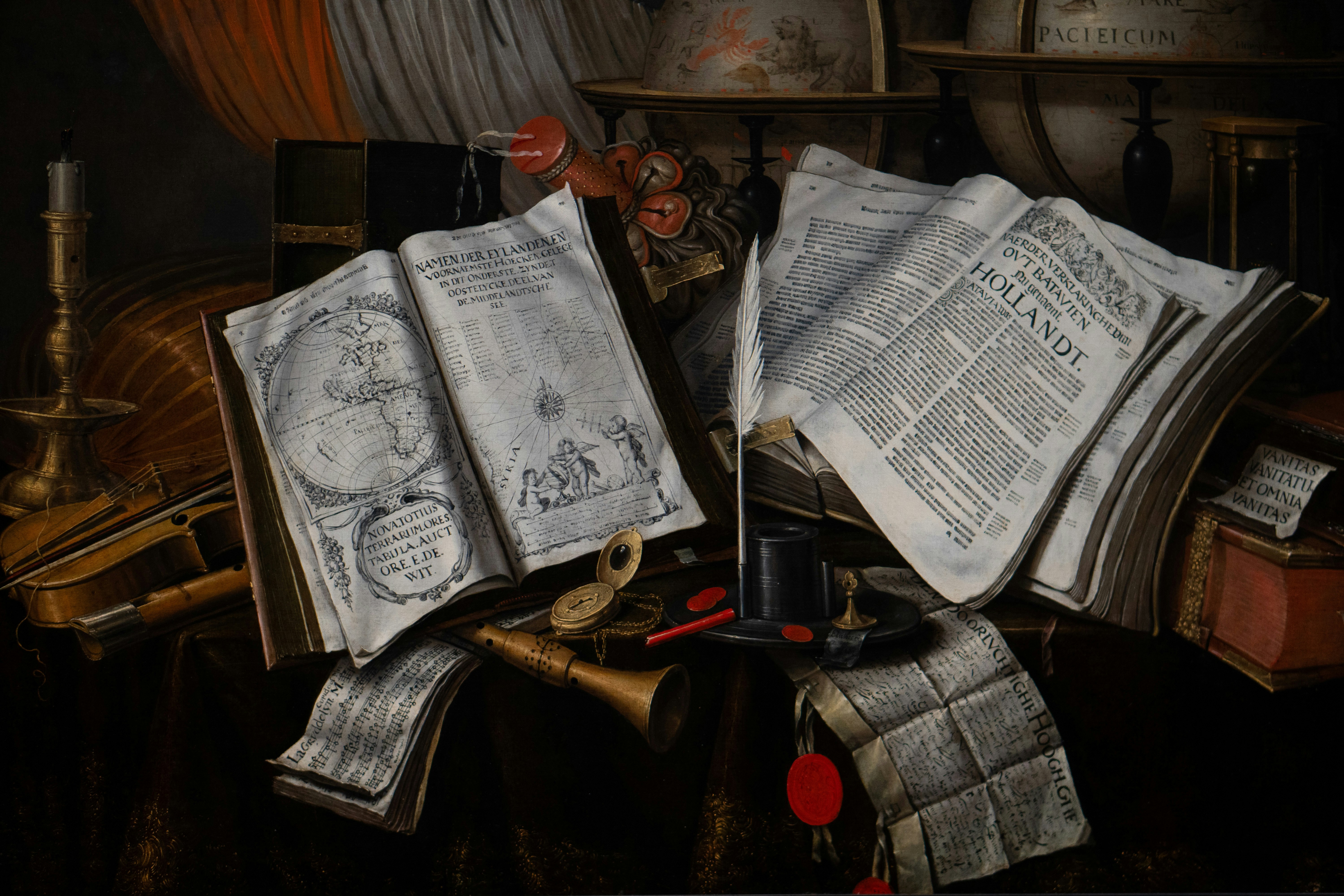 Books, maps, and other artifacts are in view.