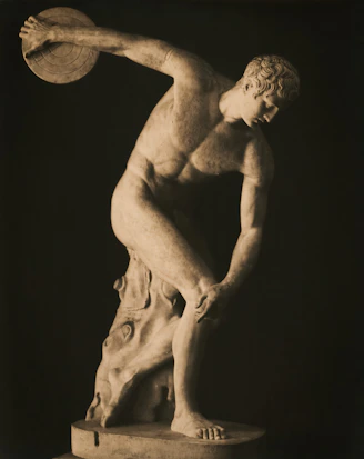 The discus thrower statue is a classic representation.