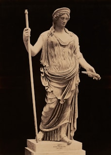 A beautiful statue of a goddess is pictured.