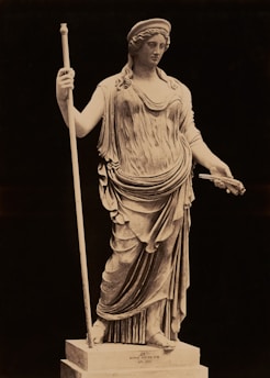 A beautiful statue of a goddess is pictured.