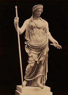 A beautiful statue of a goddess is pictured.