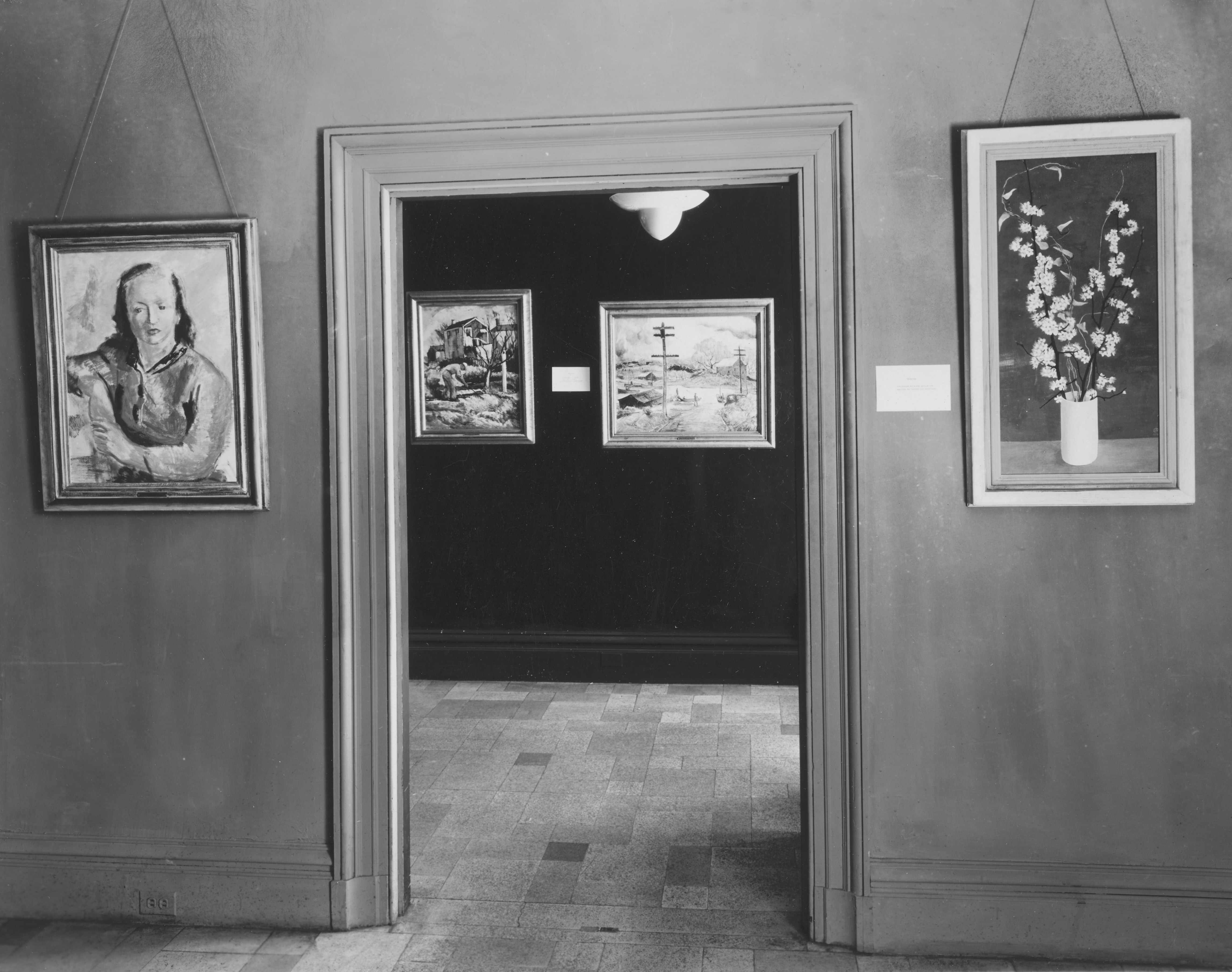 Artwork hanging inside a gallery entrance