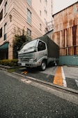 A delivery truck is parked on the street.