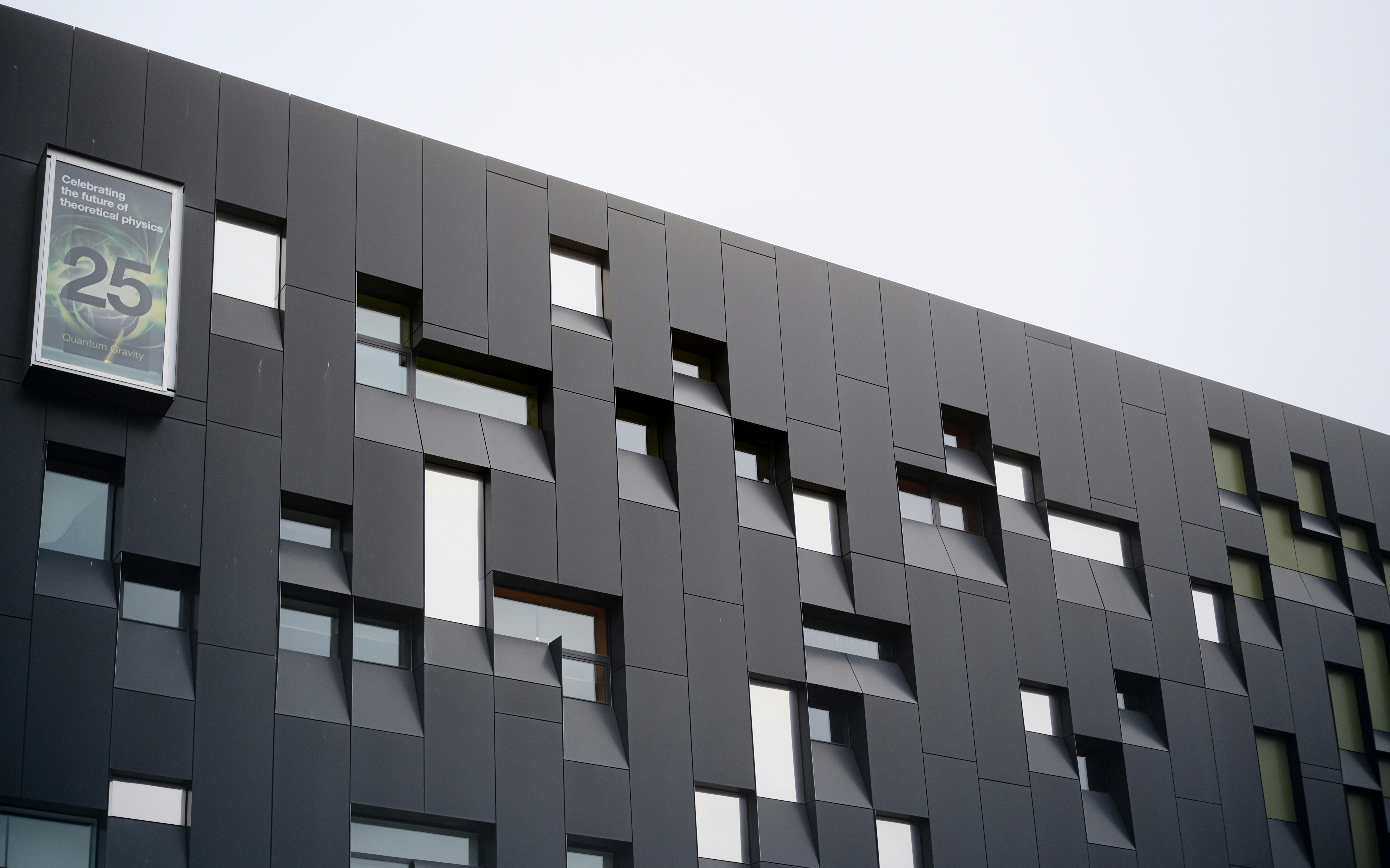 Modern building with unique window design.