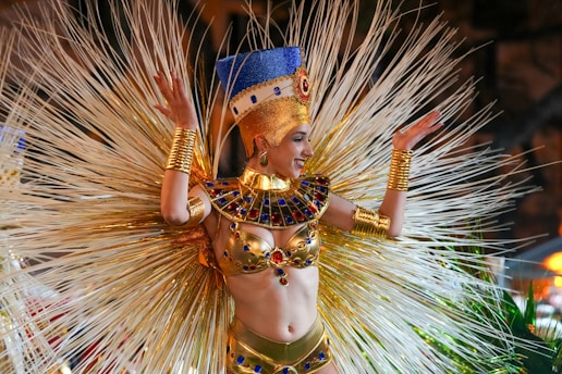 A dazzling woman in a golden costume.
