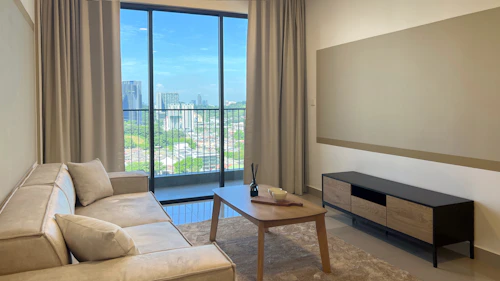 Modern living room with scenic city views.