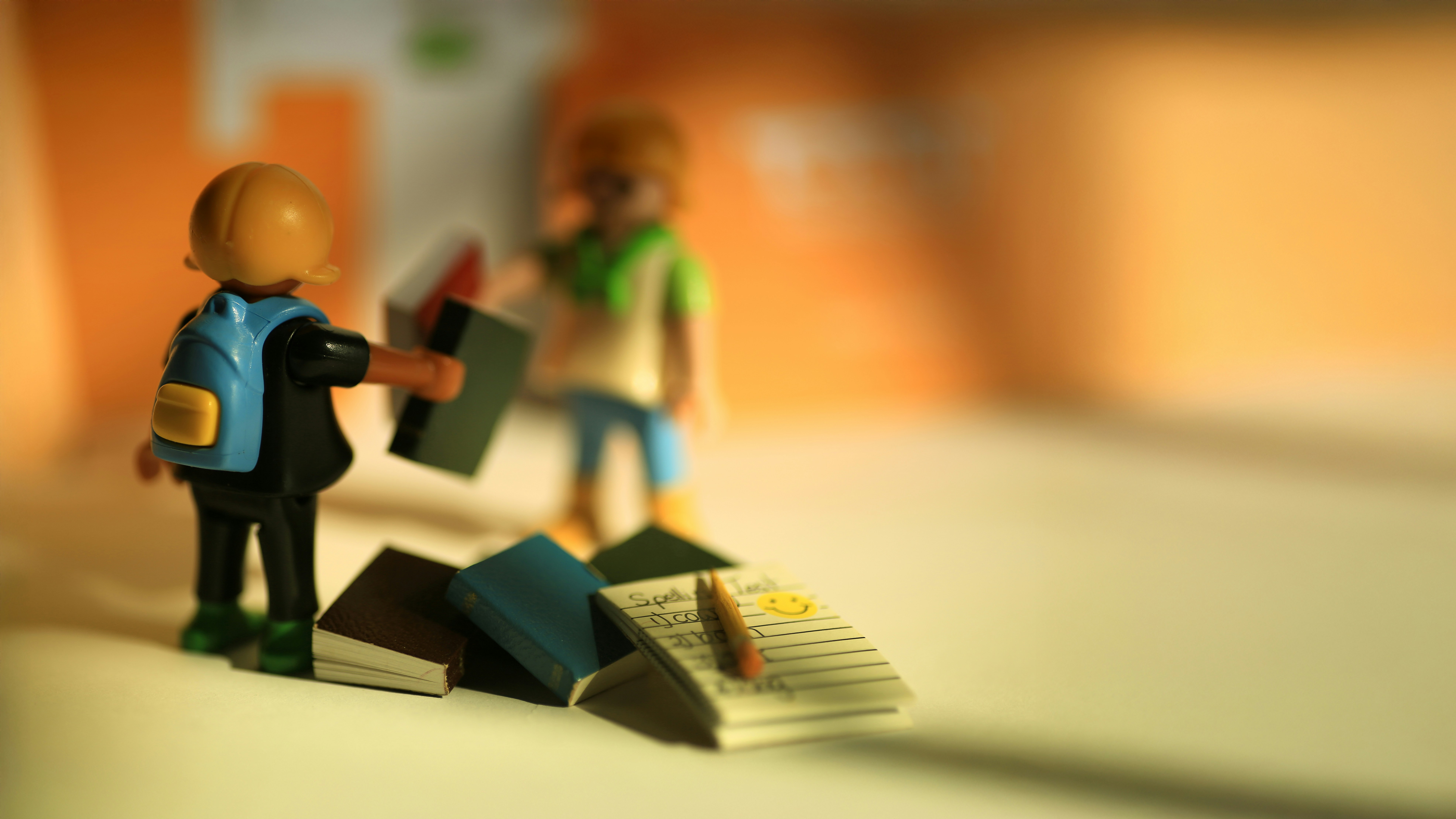 Playmobile kids with school books.