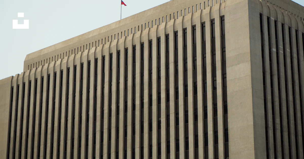A modern building shows vertical architectural lines. photo – Free ...
