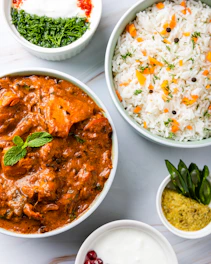Delicious indian cuisine is beautifully arranged.