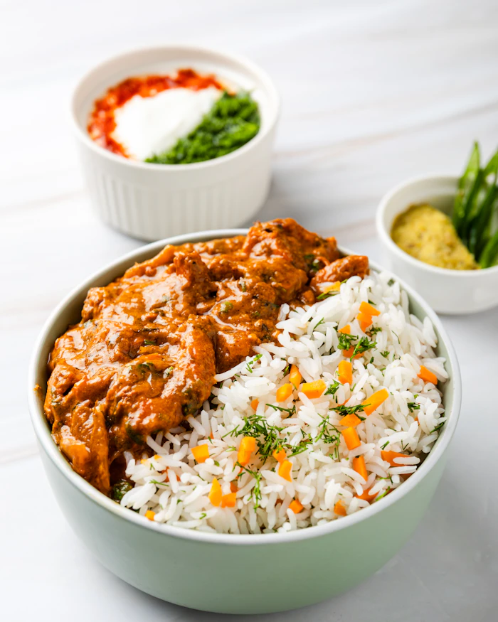 Real butter chicken curry served with rice