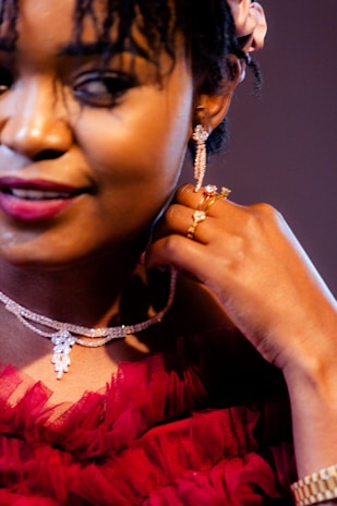 A woman shows off her beautiful jewelry.