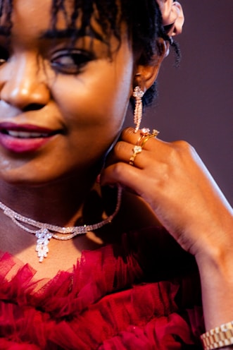 A woman shows off her beautiful jewelry.