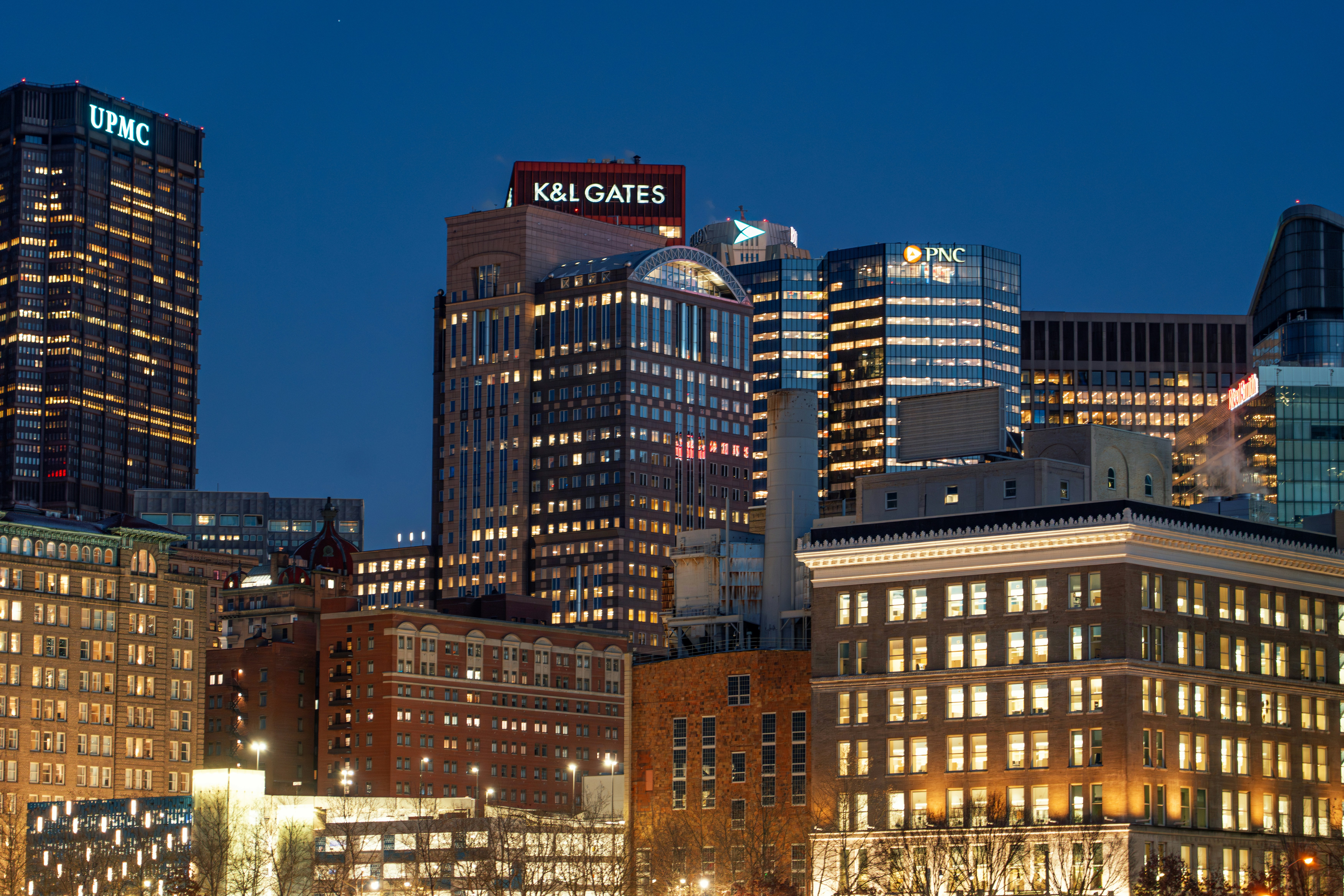 A nighttime view of a city skyline.