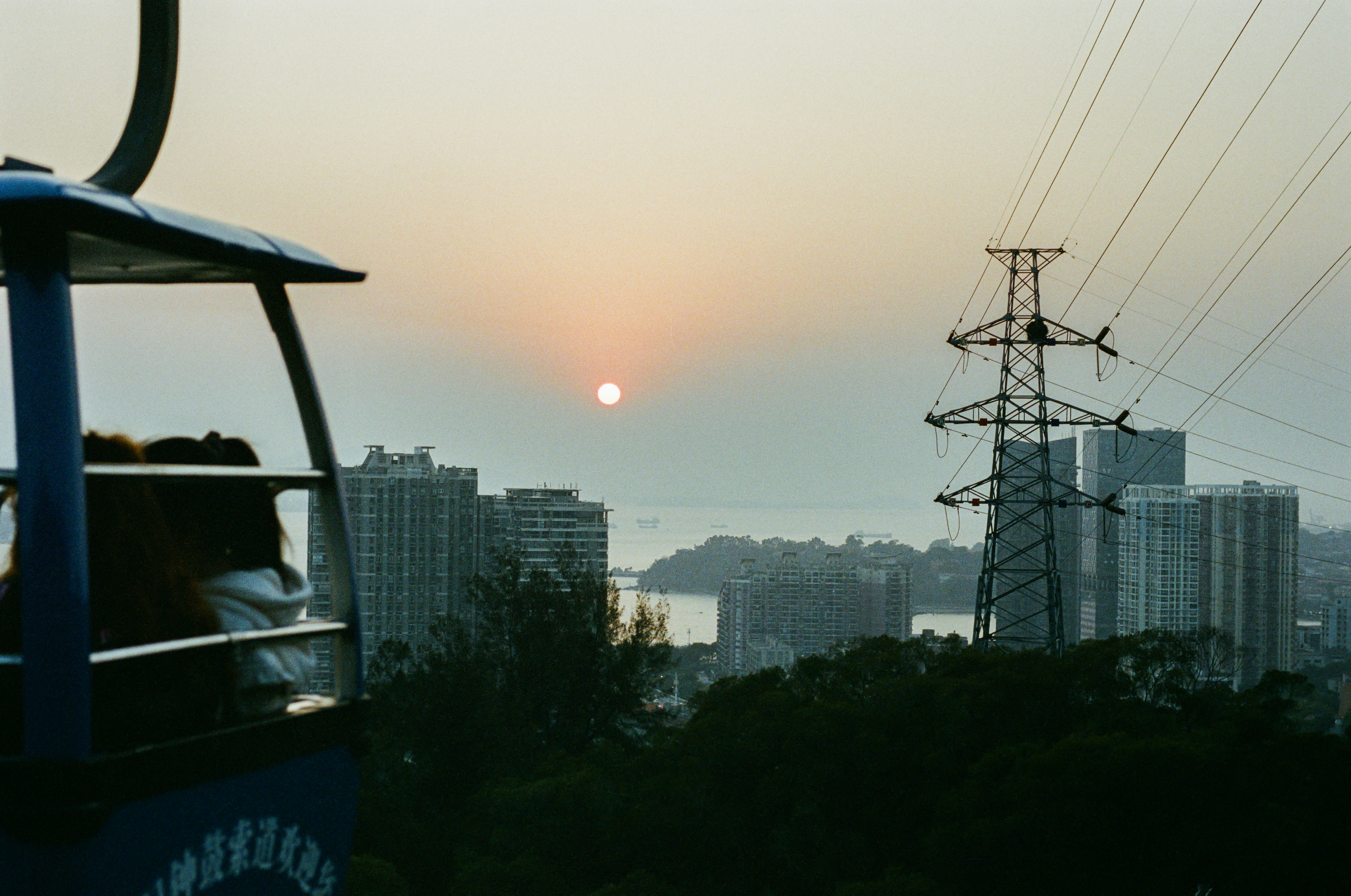 A sunset view from a cable car.