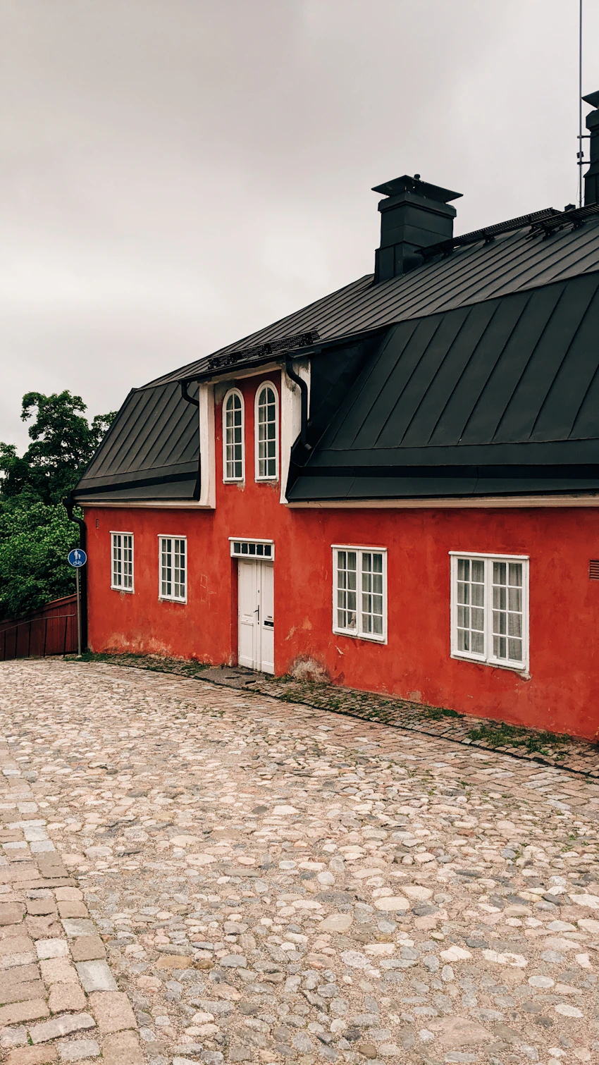 Red timber house and cobbled street in Old Porvoo