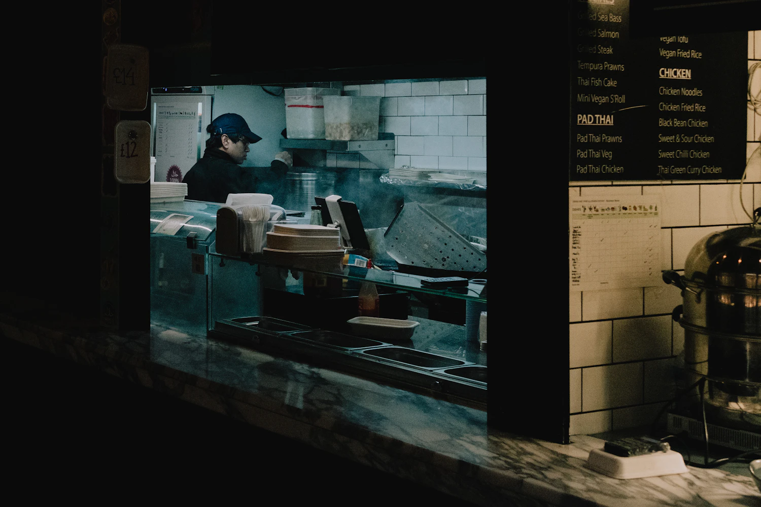 Restaurant kitchen staff working in a commercial kitchen