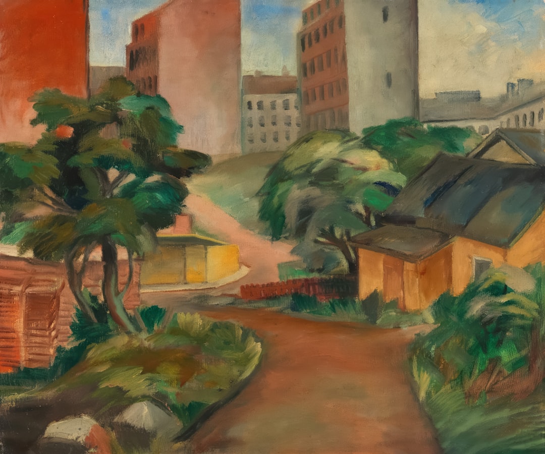 A city street with buildings and trees.