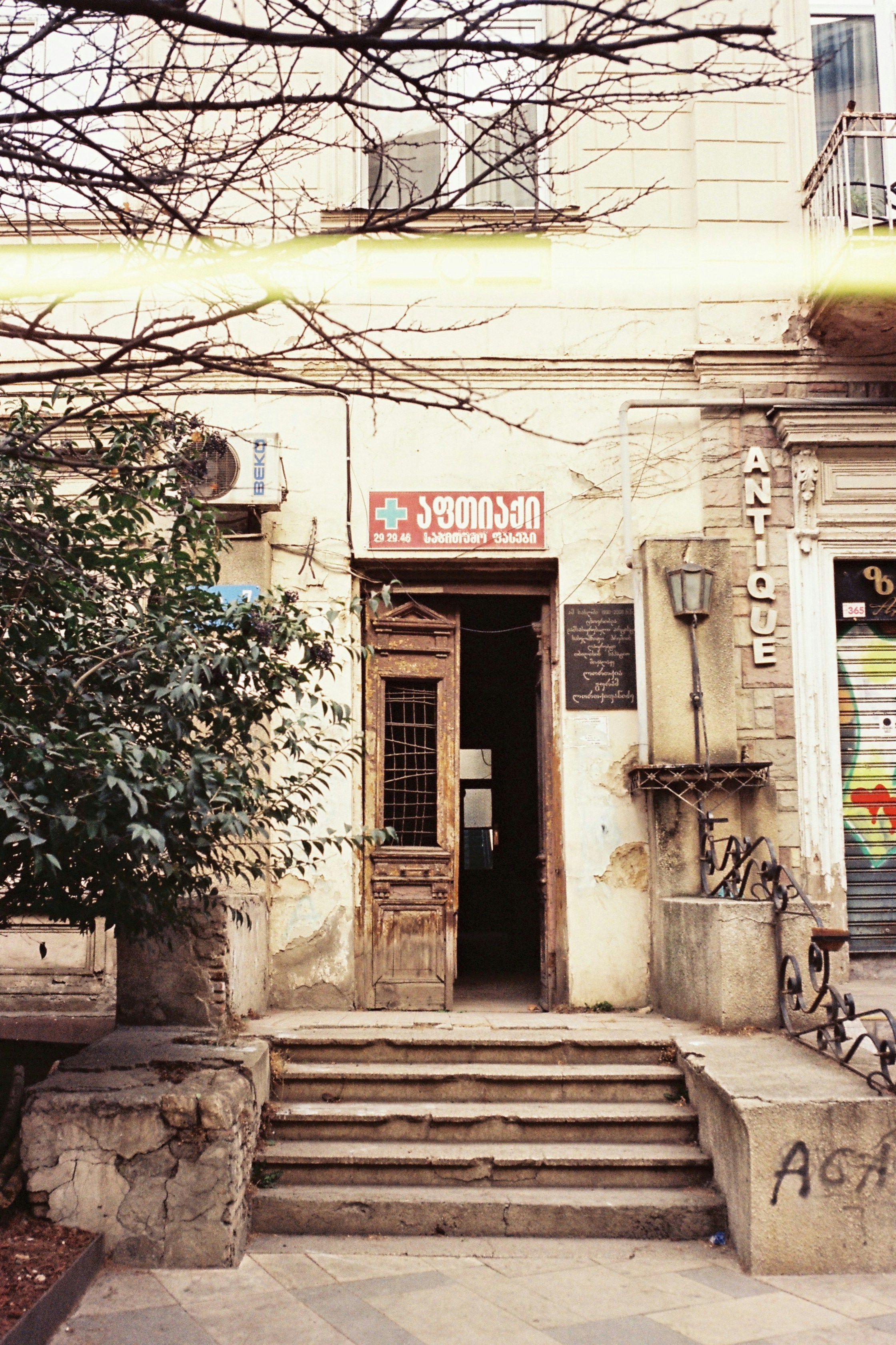 An old building entrance with an antique store.