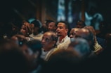A group of people are attending a gathering.