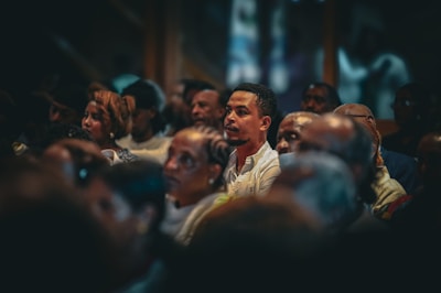 A group of people are attending a gathering.