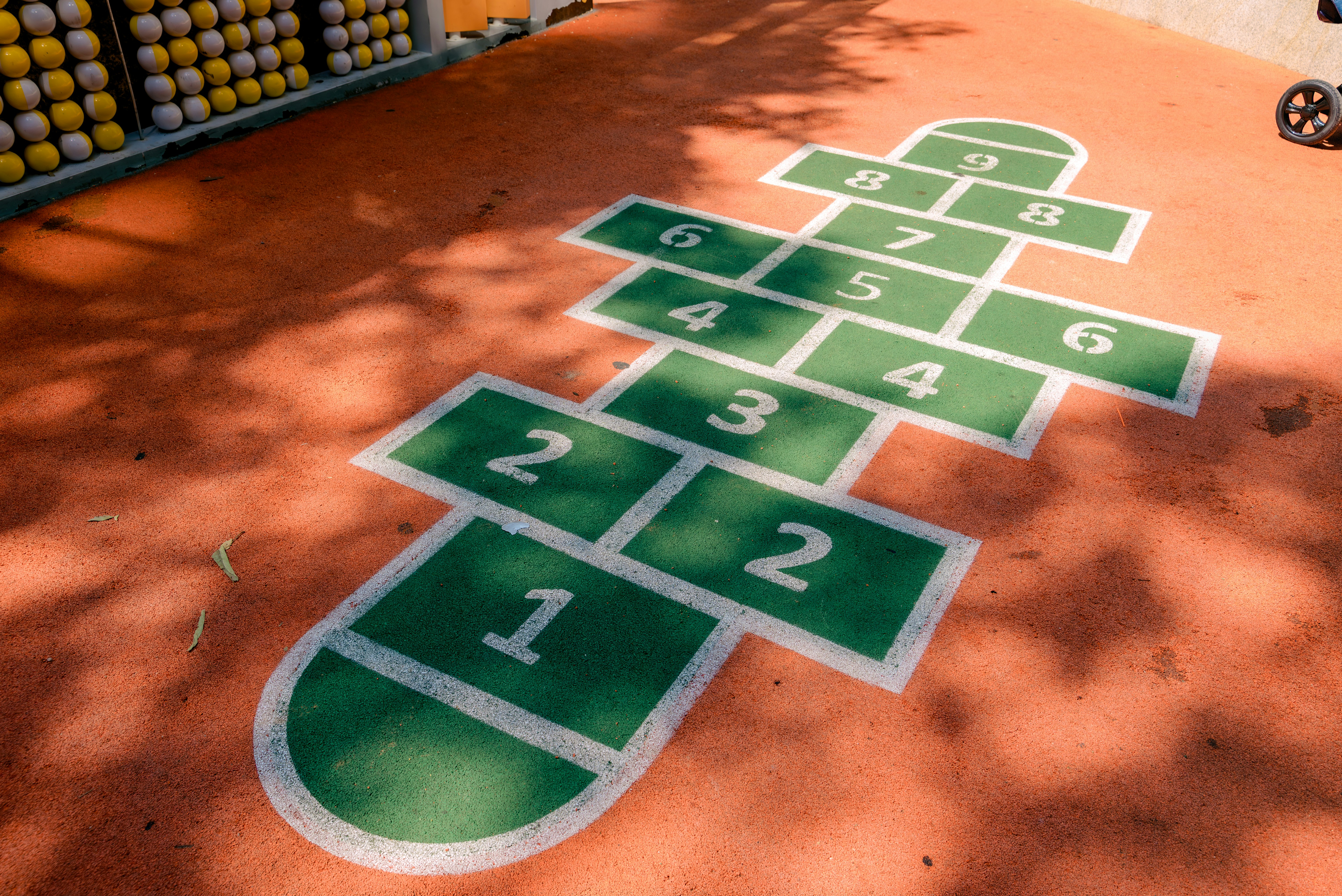 A hopscotch court painted on the ground.