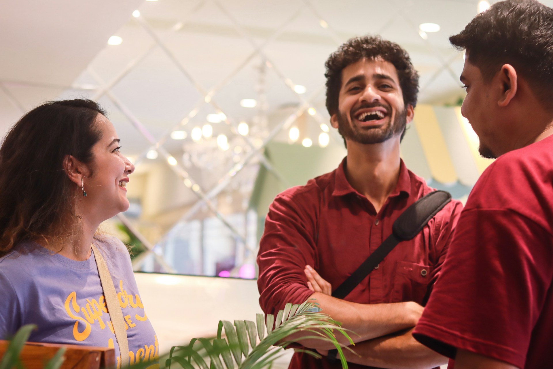 People are happily laughing and talking together.