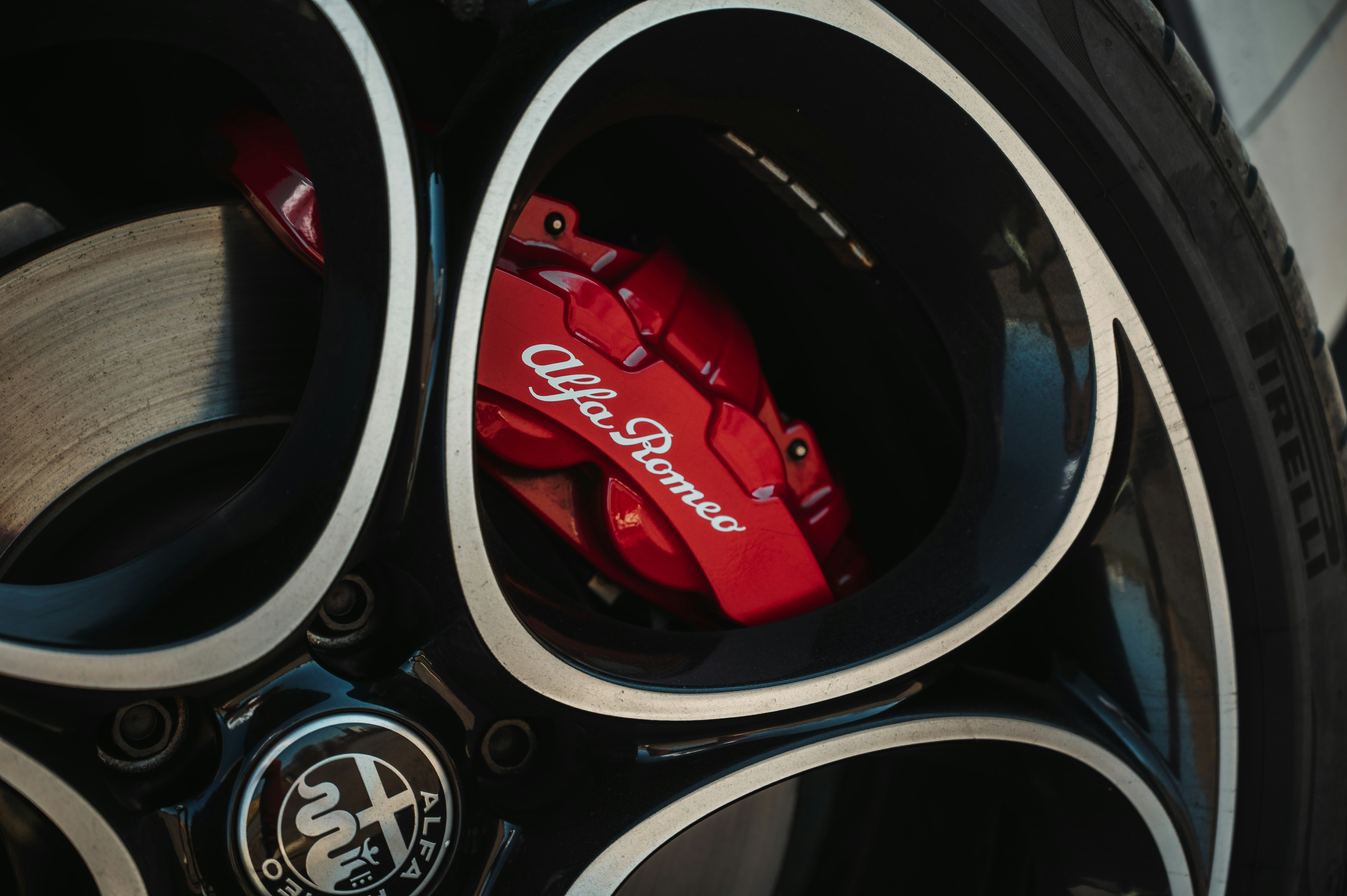 Alfa romeo's red brake calipers are visible.