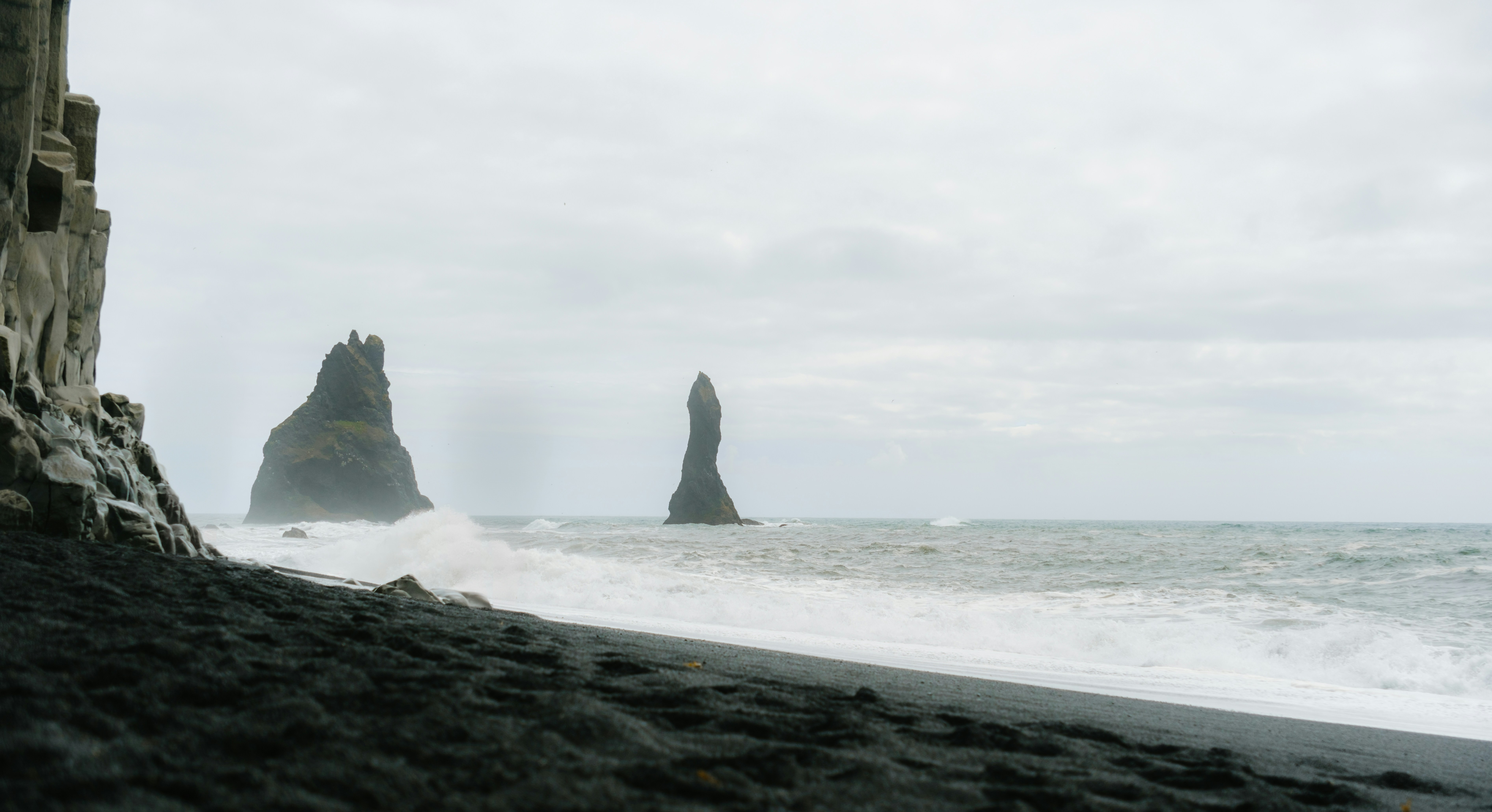 Seashore view with rock formations in iceland.
