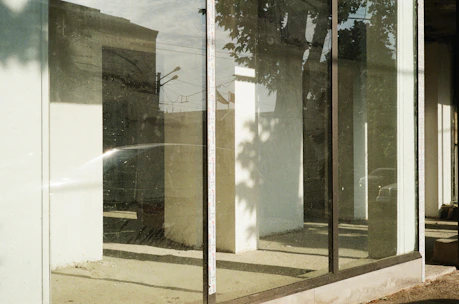 Empty store front with large windows.