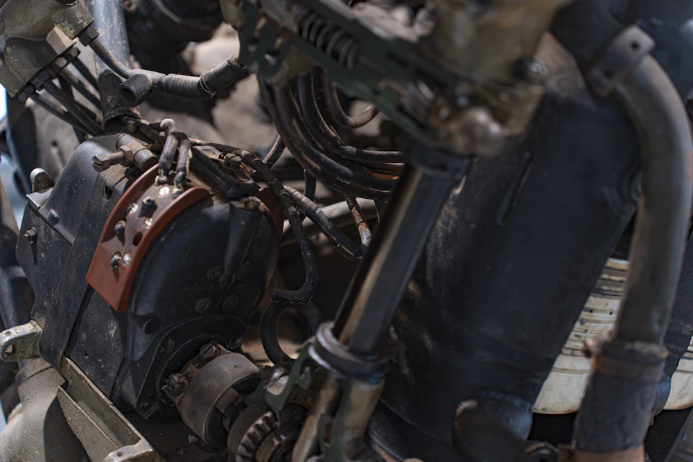 Aircraft mechanic working on an engine