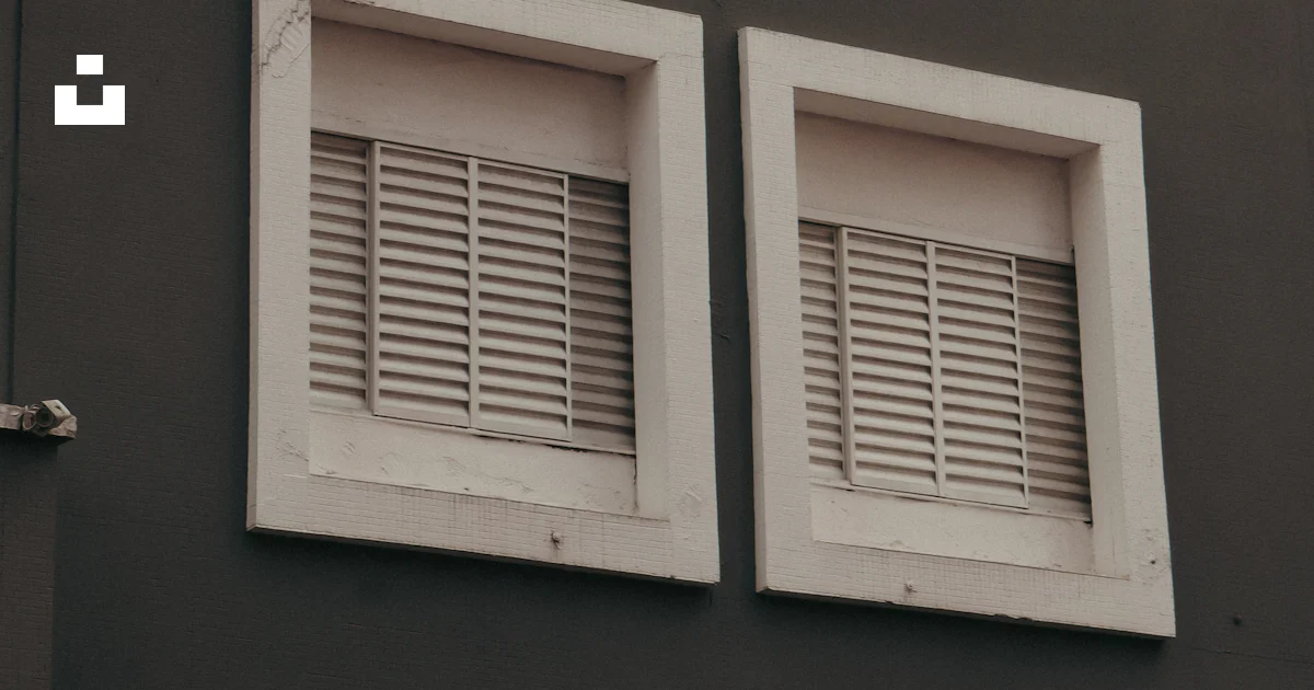 Four square windows with shutters on a grey wall. photo – Free Window ...