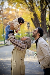 Family enjoys a beautiful autumn day in the park.