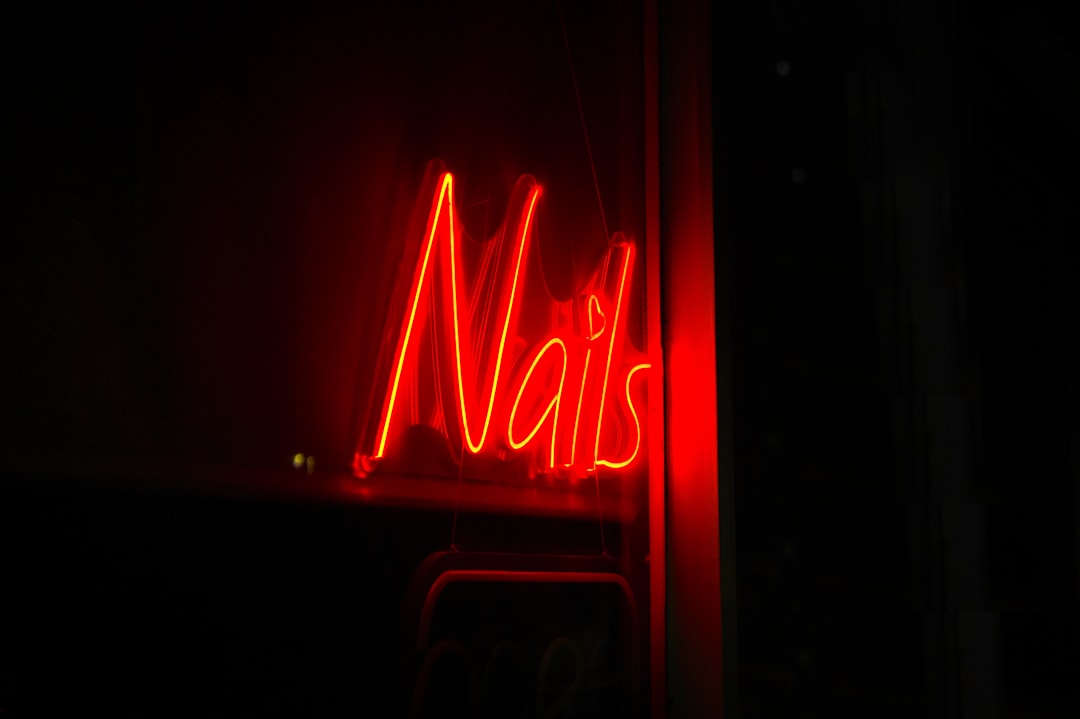 Neon sign displays the word
