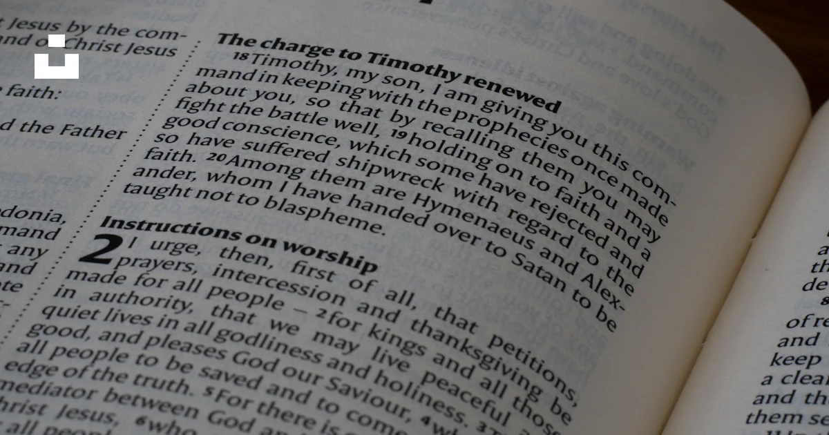 Timothy Text A bible open to the book of 1 timothy. photo – Free Text Image on Unsplash
