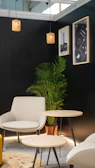 Cozy living room interior with modern decor and lighting.