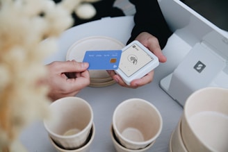 Paying with a credit card at a register.
