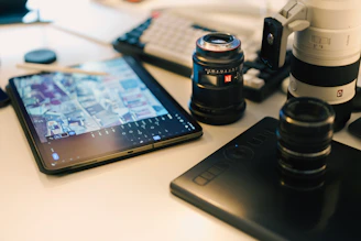 Photography equipment on a well-lit desk.