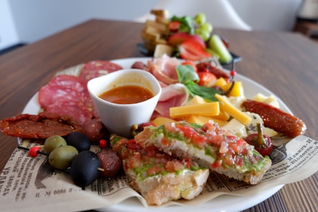 A delicious charcuterie board with a variety of snacks.
