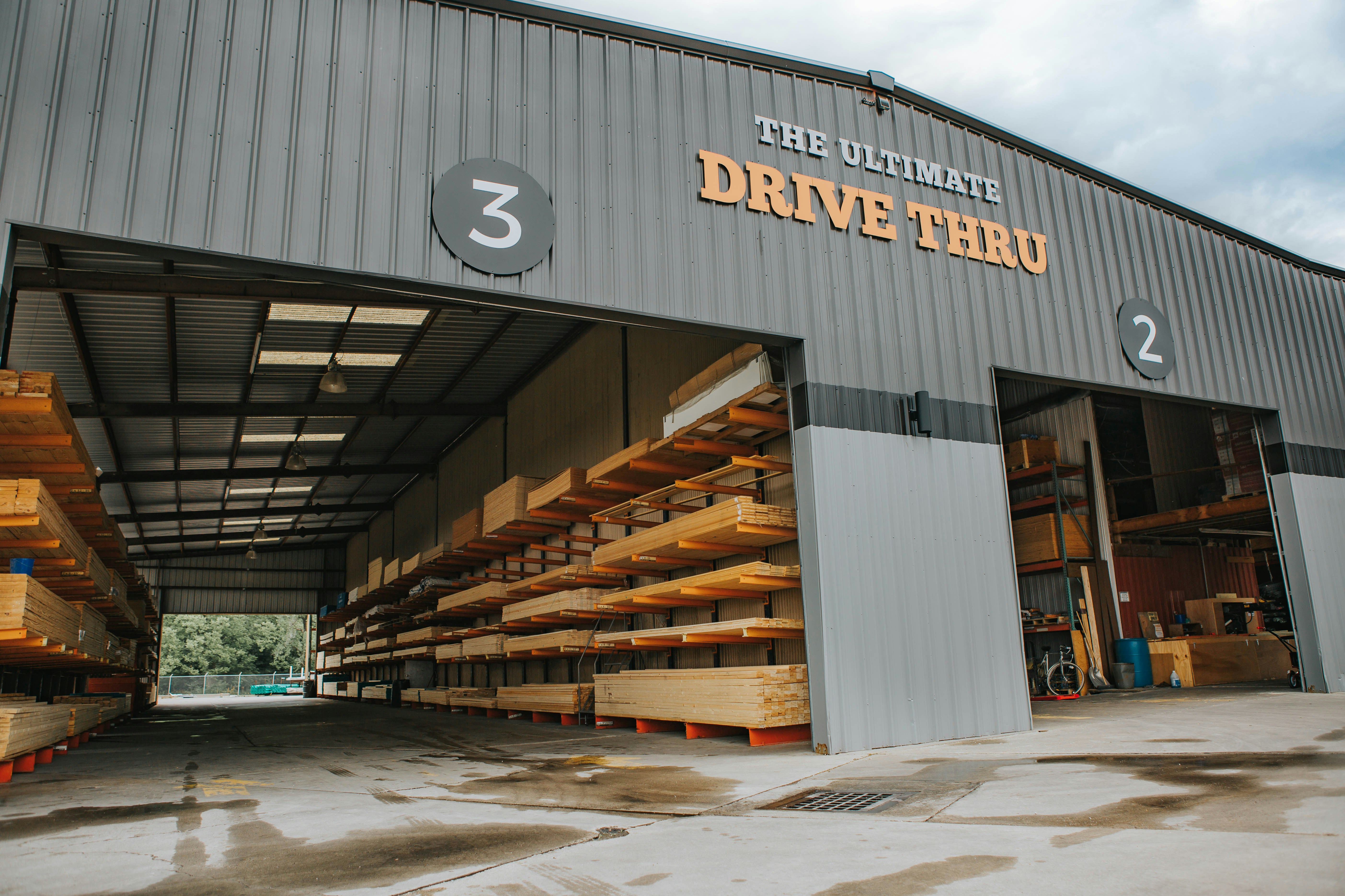 A drive-thru lumberyard with tyre storage
