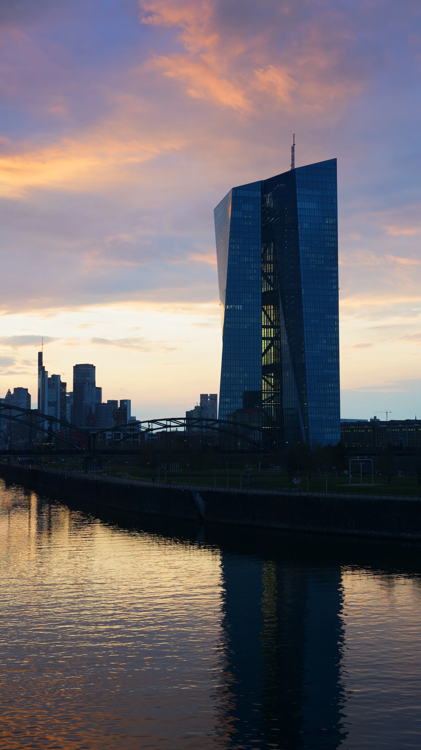 European Central Bank headquarters in Frankfurt reflected in the river