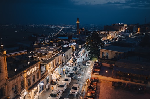 City lights illuminate the night sky.