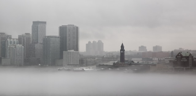 City skyline in fog.