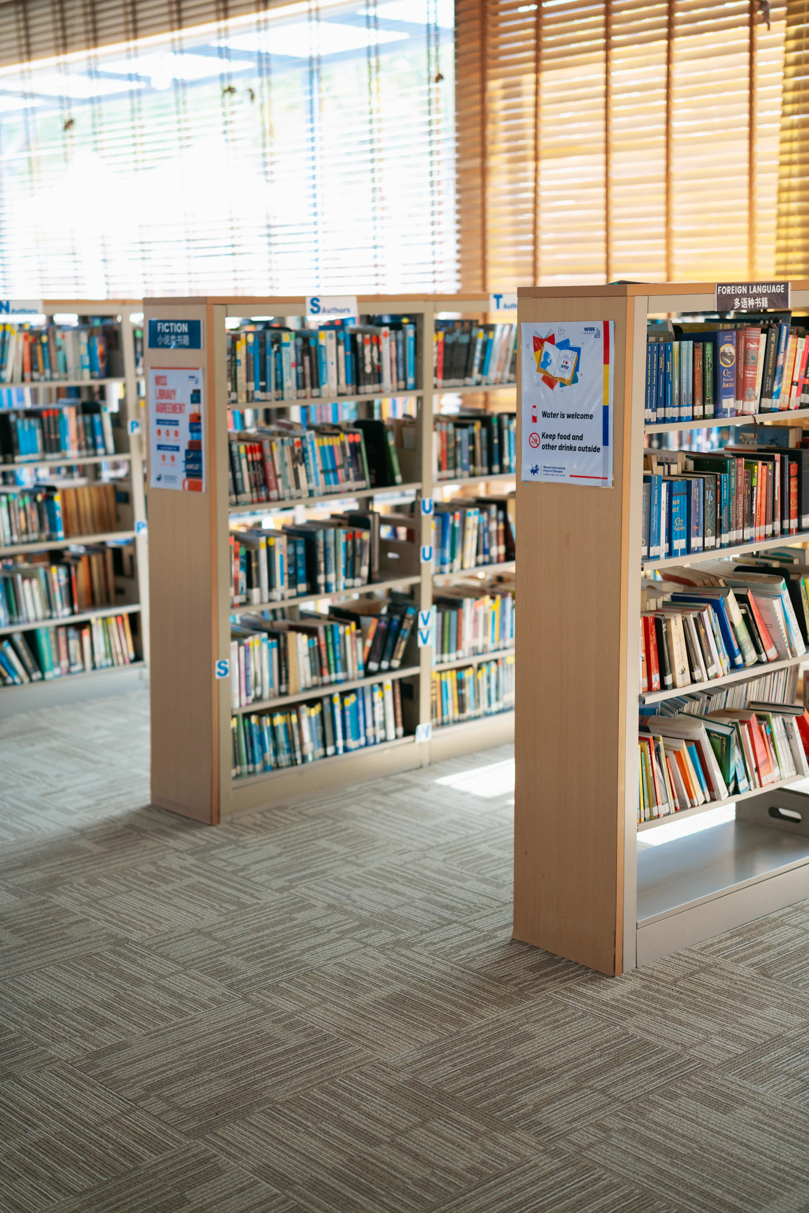 Rows of bookshelves in the VIDYA school library