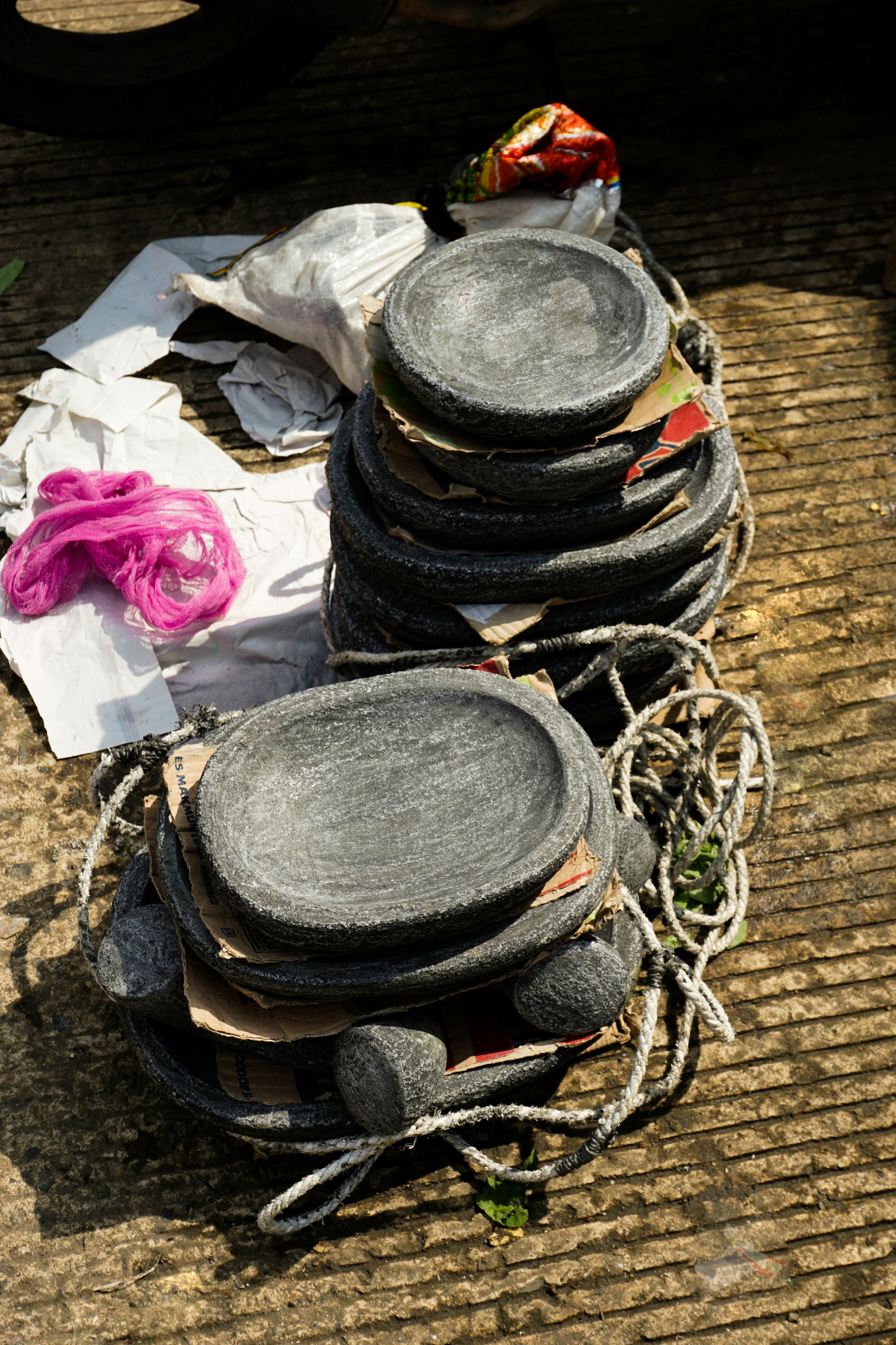 Piles of stone mortars ready for sale.