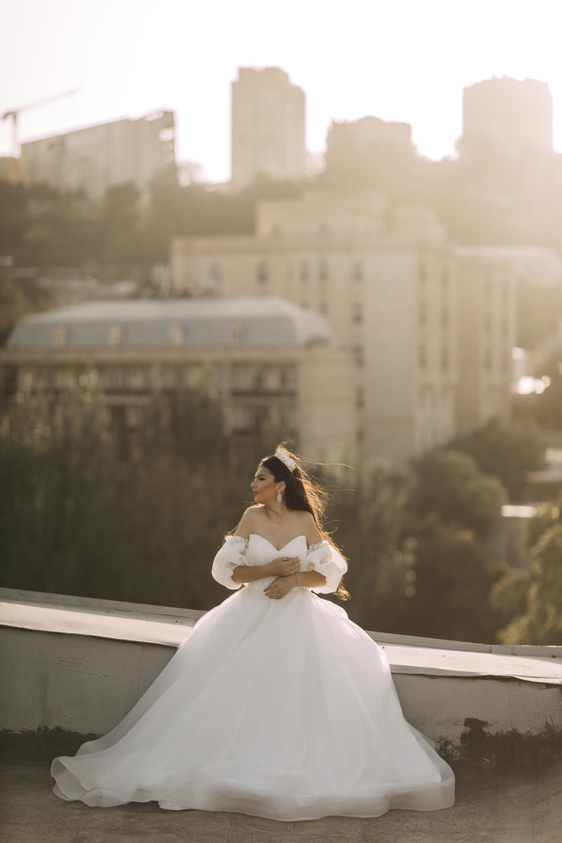 An elegant bridal gown in a softly lit setting