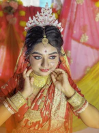 A beautiful indian bride in traditional attire.