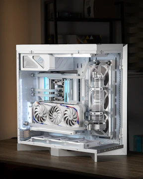 A sleek, custom PC build glows with blue light.