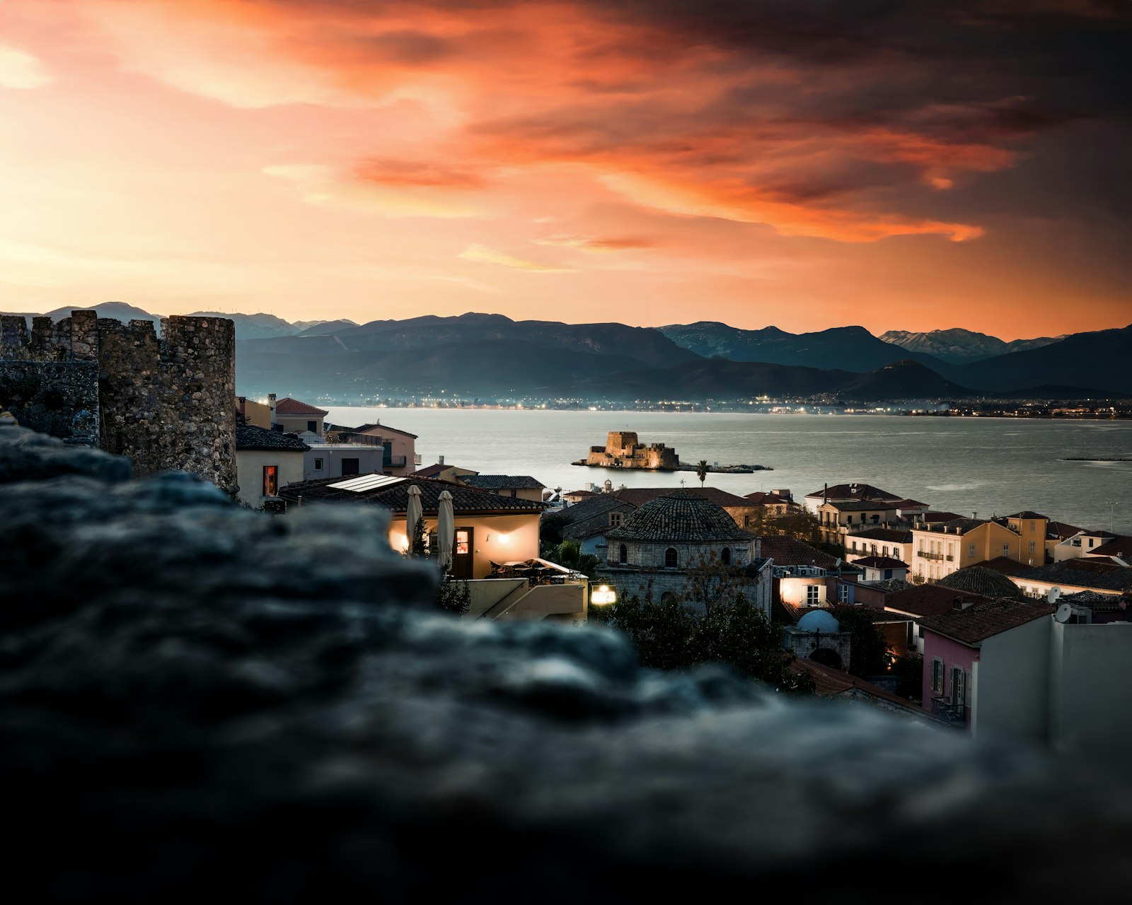 Nafplio at sunset, with the Bourtzi fortress in the Argolic Gulf