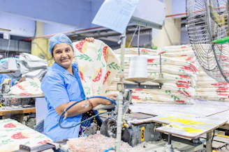 A woman works in a textile factory.